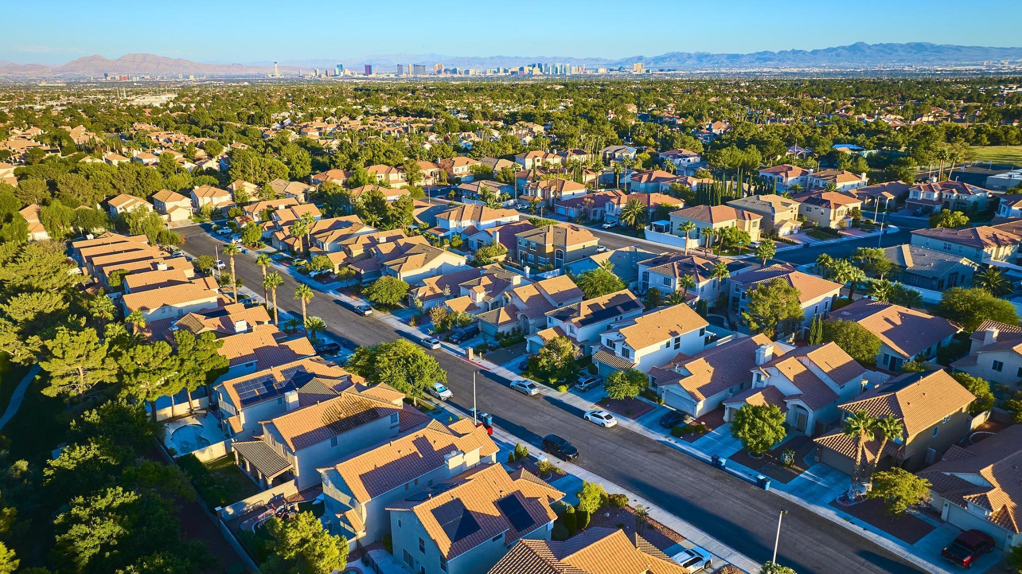 Aerial view of Las Vegas single-family neighborhoods with the Las Vegas Strip in the distance