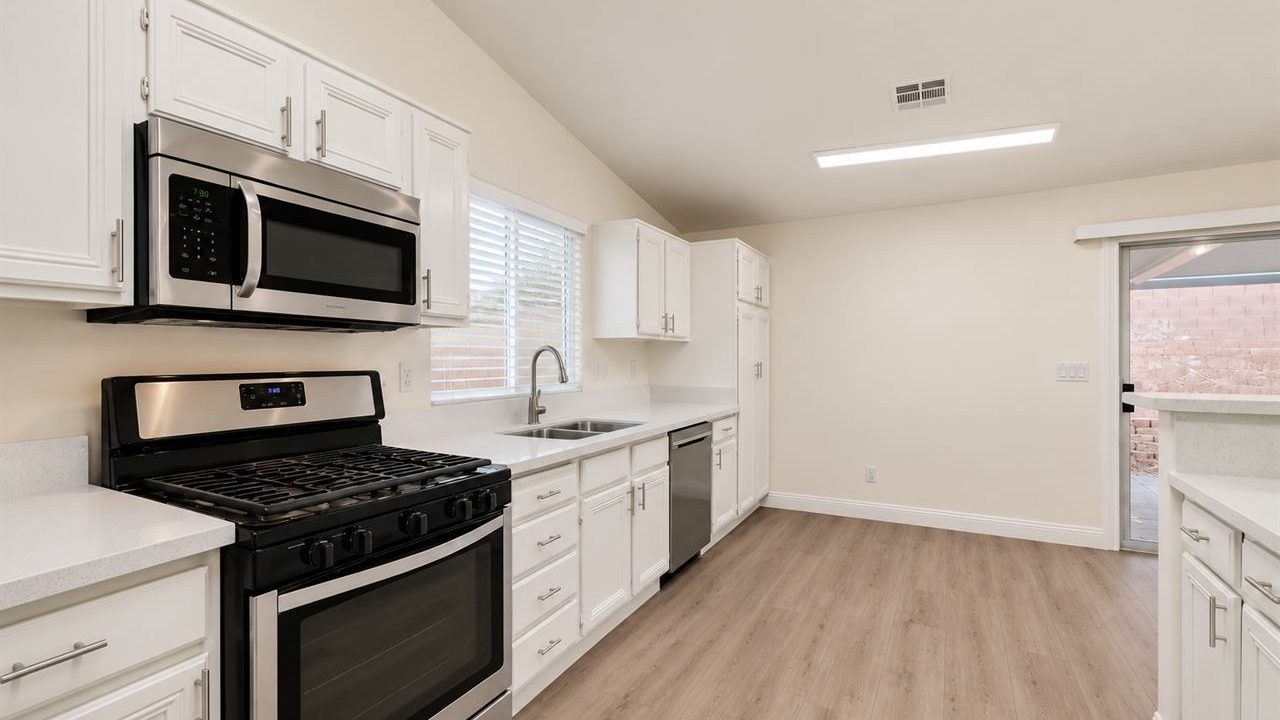 Renovated kitchen with stainless appliances in a Las Vegas, Nevada rental property